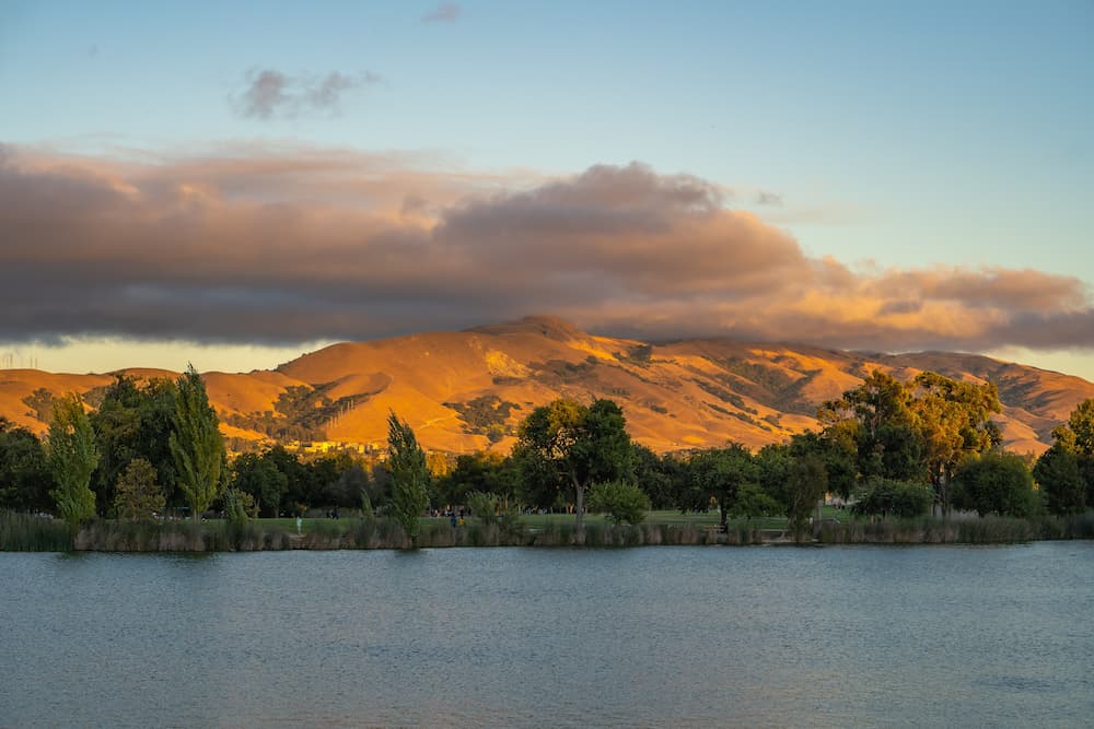Scenic view of Lake Elizabeth and Mission Peak at sunset, Fremont Central Park